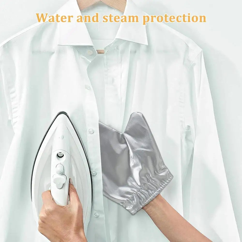 A hand is holding a silver heat resistant garment steamer mitt, demonstrating water and steam protection for clothing.