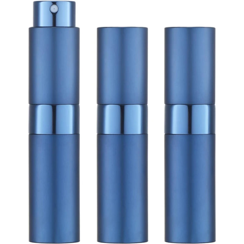 A set of three blue travel perfume atomizers standing vertically.