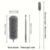 A gray dust duster with a long telescopic rod shown next to its disassembled parts.