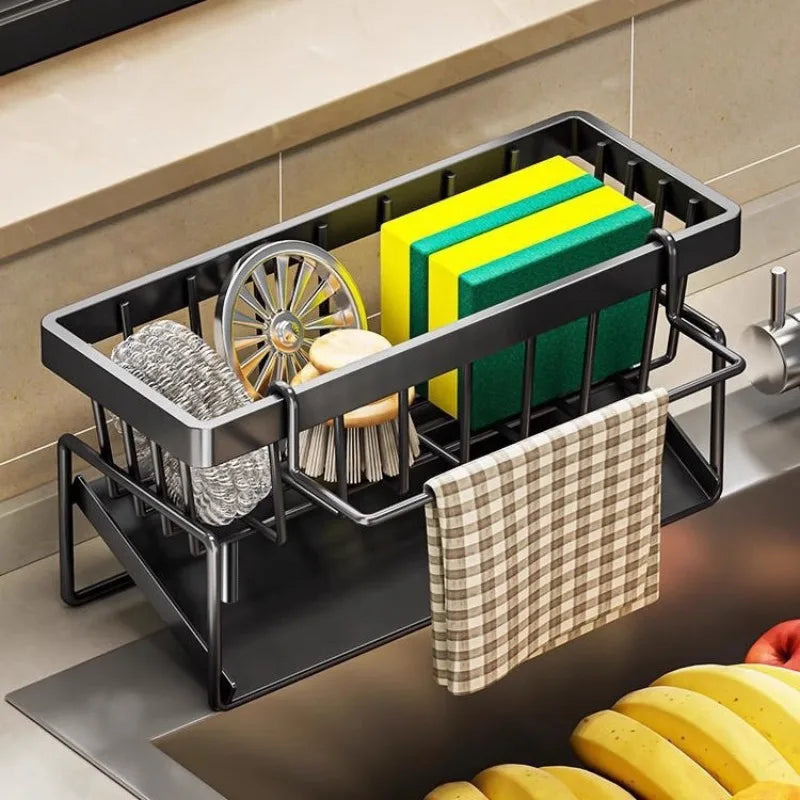 Black kitchen sponge holder and drain rack with a hanging hook filled with green and yellow sponges.
