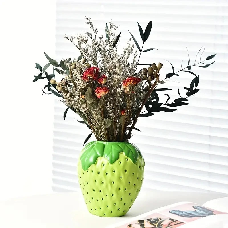 Kreatische, stachel-förmige Hartefleuriervase mit getrocknetem Grün und Blumen.