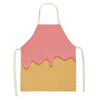 A pink glazed linen apron with a yellow waffle texture.