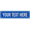 A rectangular blue metal door sign with the text YOUR TEXT HERE in white capital letters.
