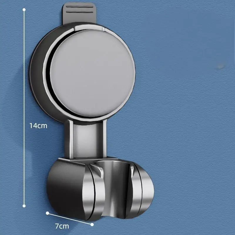 A silver shower head holder with a suction cup design is shown against a blue background.