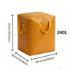 A tan heavy-duty waterproof storage bag with handles shown from the top view.