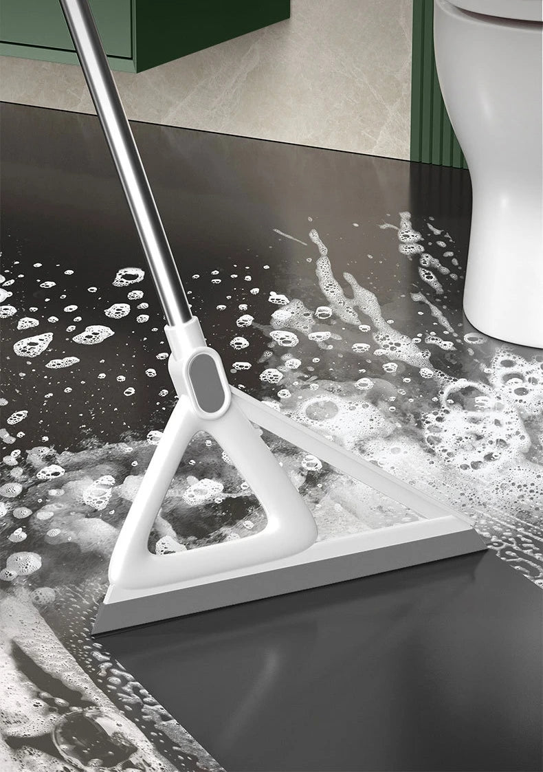 A white silicone window and surface cleaner is shown cleaning a dark surface with soapy water.