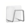 Stainless steel sponge holder rack with a metal bar and suction cup mount.