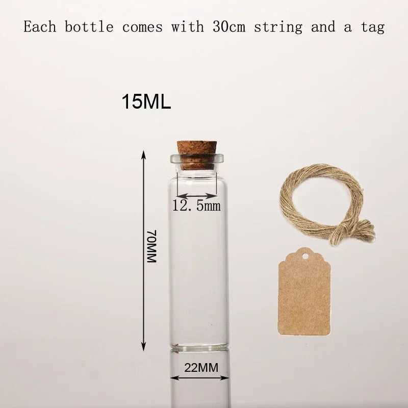 A clear glass bottle with a cork, measuring 15ml, accompanied by a 30cm string and a tag.