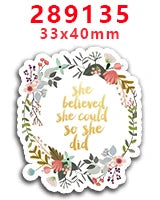 Sticker die-cut circular with floral greenery and pink accents, featuring the text 'she believed she could so she did'