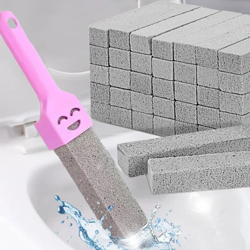 A pink natural pumice cleaning stick is shown cleaning limescale off a white surface.