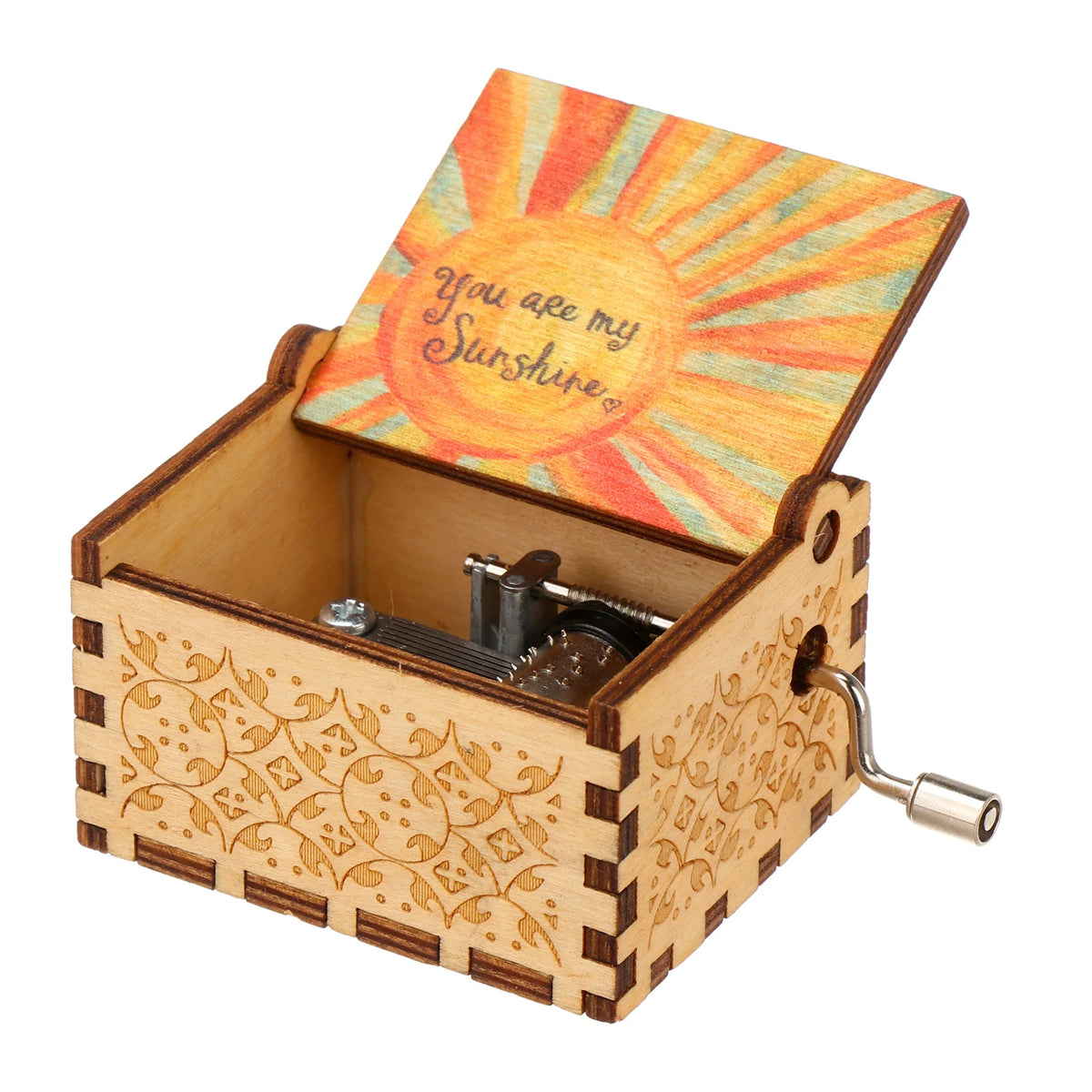 A vintage engraved wooden music box with a lid featuring a sun design.