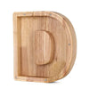 Piggy bank alphabet shaped like the letter D for savings.