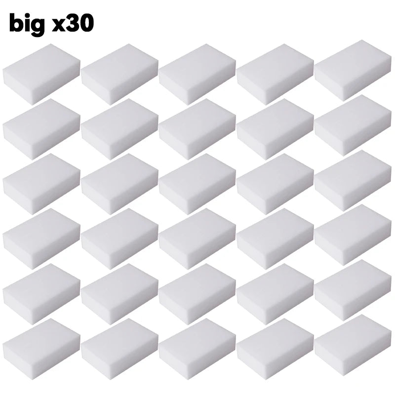 A set of thirty white melamine cleaning sponges or magic erasers.