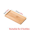 A wooden tray with measurements showing it is suitable for 2 bottles.