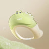 A light green adjustable baby bath shampoo shield cap is shown against a soft, blurred background.