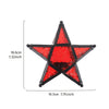 A red forged iron star hanging candlestick with a black frame and decorative pattern.