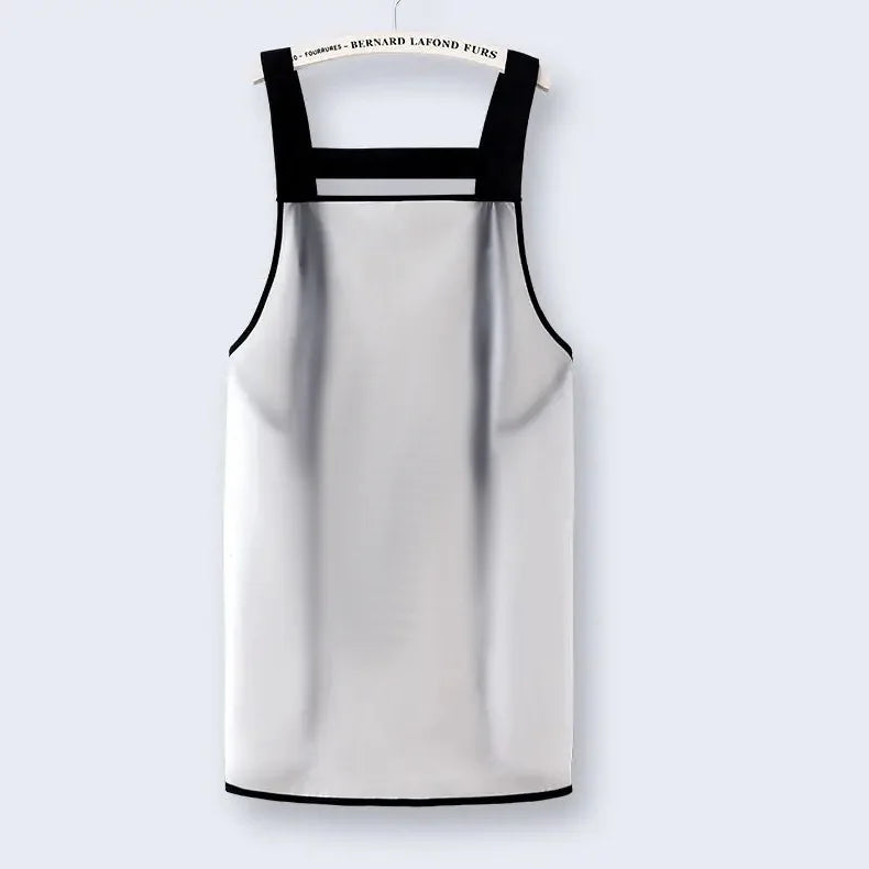 A white waterproof transparent kitchen apron with black straps and bib.