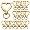 A set of gold heart-shaped spring hook keychains, featuring various sizes and styles.
