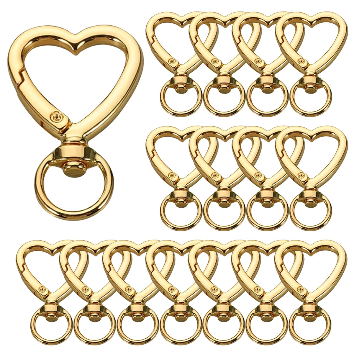 A set of gold heart-shaped spring hook keychains, featuring various sizes and styles.