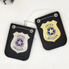 A black police officer cosplay badge play toy with a gold seal and blue star design.