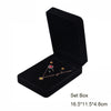 Black velvet jewelry storage box set with a lid and a tray inside