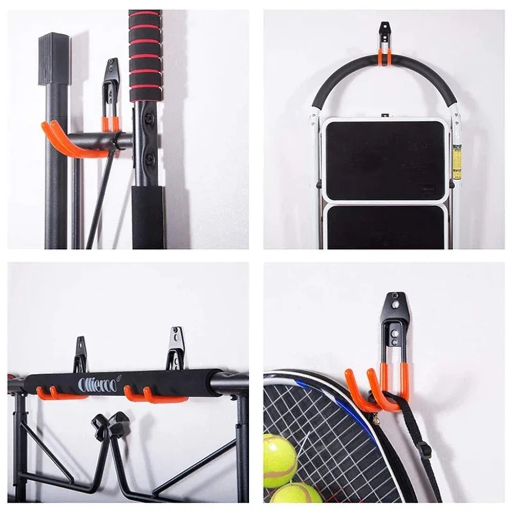 Un juego de ganchos metálicos para pared de uso rudo con agarres naranja y negro para colgar objetos.