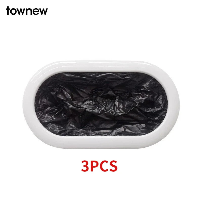 Three black reusable refill rings for kitchen trash cans