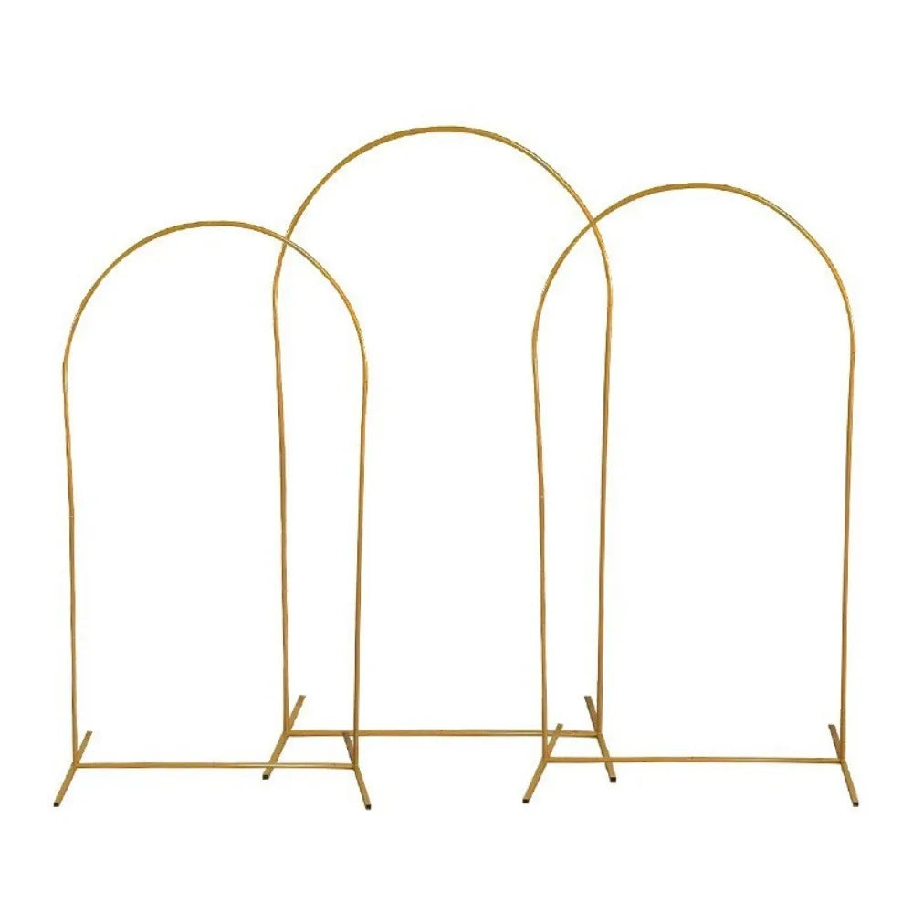 Three adjustable gold arch stands for party decor