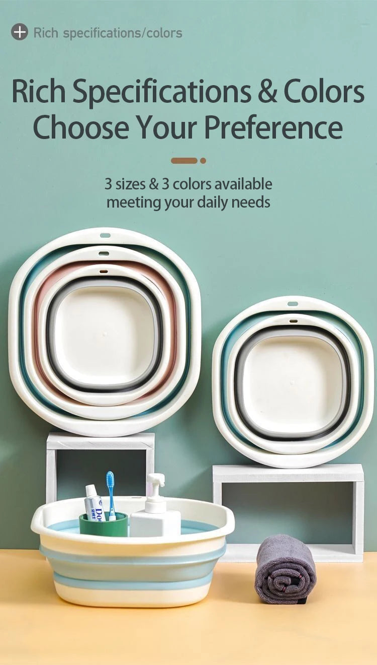 A set of three nested plastic wash basins in various shades of white and pink resting on a light wooden surface.