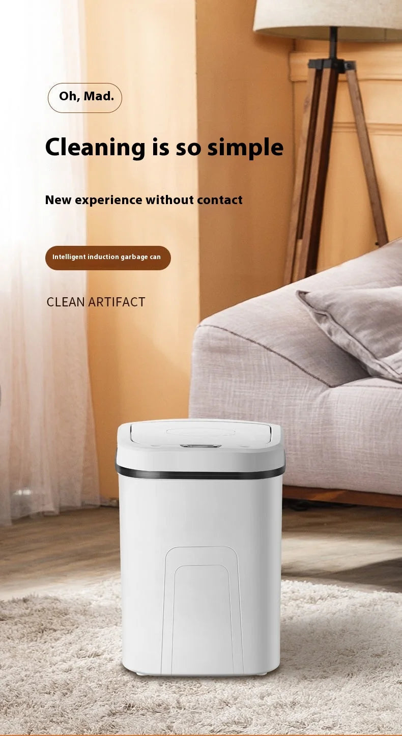 A white touchless sensor trash can is placed on a light-colored rug in a modern living room setting.