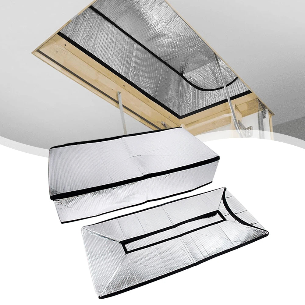Silver heat and dust barrier material installed in an attic space.