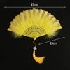 Yellow lace fabric folding hand fan with a decorative fan and tassel