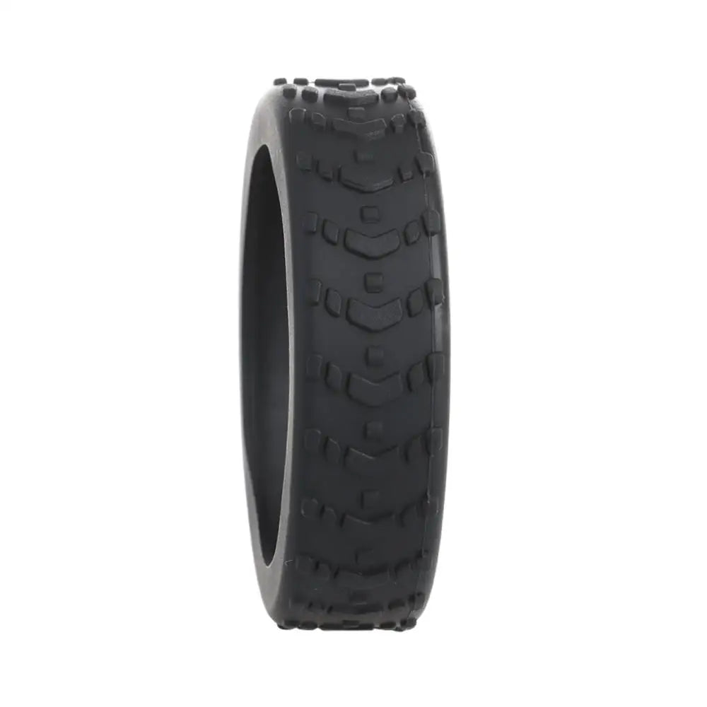 Black silicone luggage wheel protectors for protection and grip.