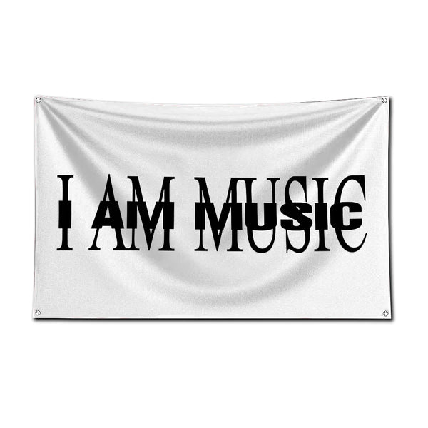 A white flag banner with the text I AM MUSIC printed in black capital letters.