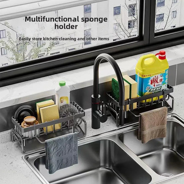A multifunctional sponge holder and drain rack with a hanging hook placed in a kitchen sink.
