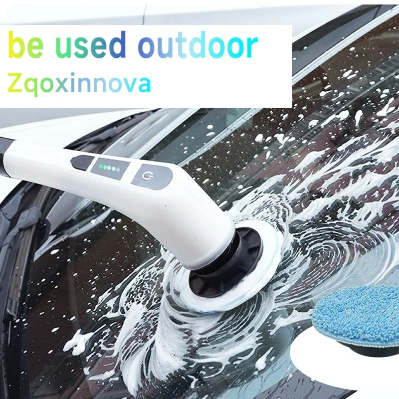 Un cepillo eléctrico blanco está limpiando manchas de agua del parabrisas de un coche.