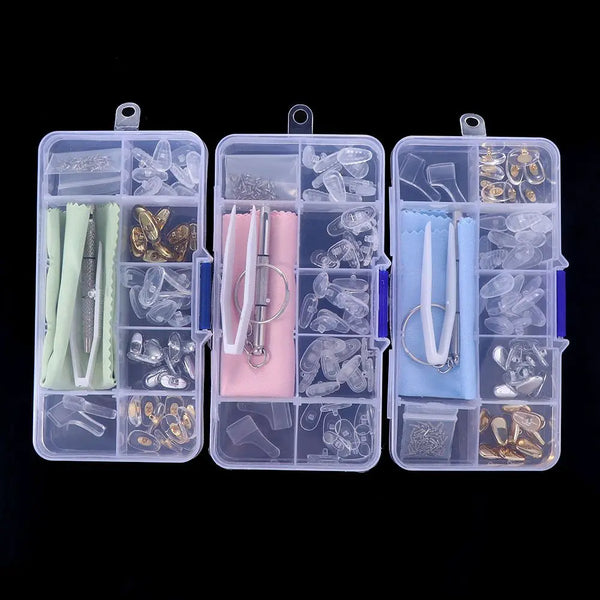 A clear plastic kit containing various tools and components for precision glasses repair, including screwdrivers and speciali