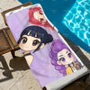 A purple glitter chibi anime beach towel featuring two cute female characters