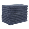 A stack of dark blue ultra-absorbent microfiber bath towels.