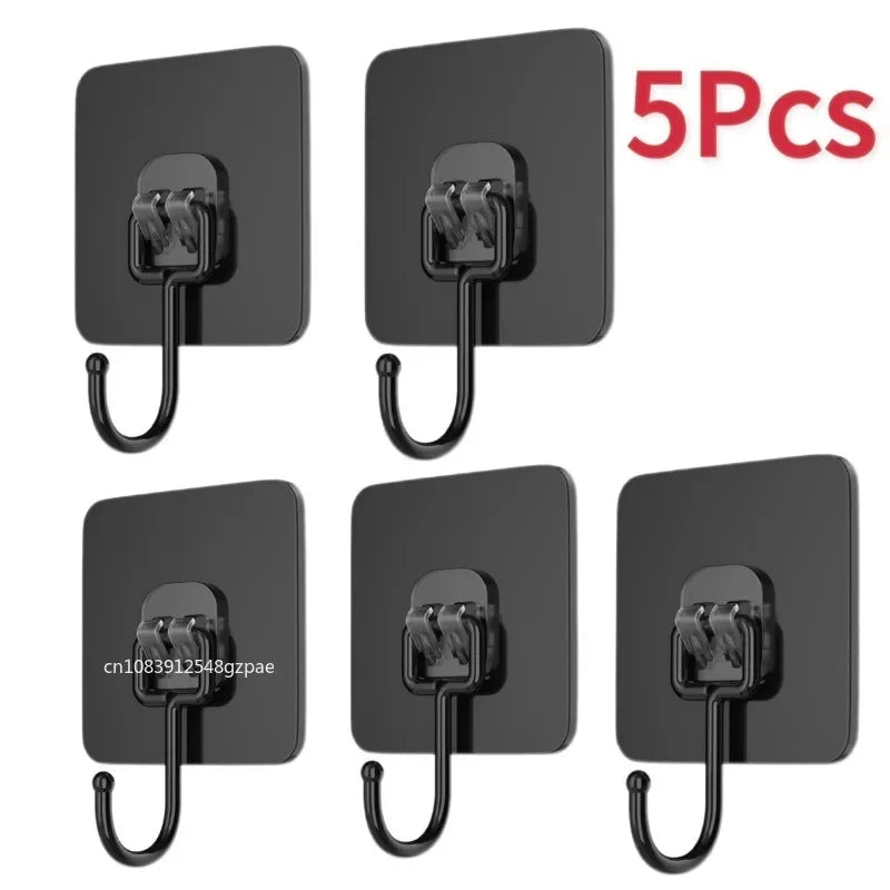 Five black self-adhesive rotating wall hooks for storage and display.