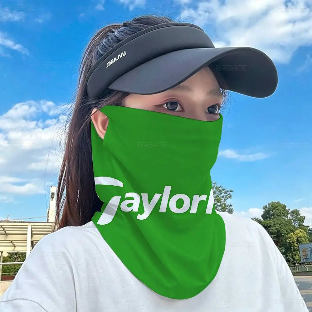 A person wearing a bright green neck gaiter covering their lower face outdoors under a blue sky.