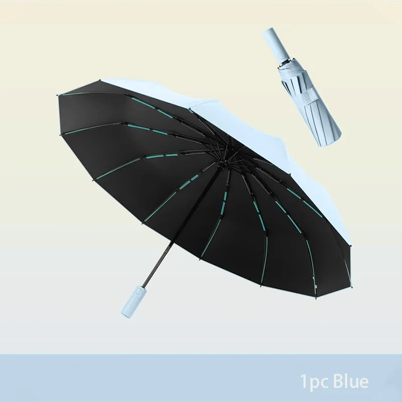 A black and white heavy-duty automatic windproof umbrella is shown open against a light background.