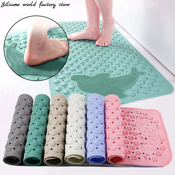 A collection of silicone bath mats in various colors and shapes, including a rectangular dolphin mat.