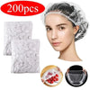 A woman wearing a silver disposable shower cap, with loose caps and a close-up of the product.