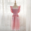 Pink lace detail cotton linen kitchen apron displayed on a mannequin.