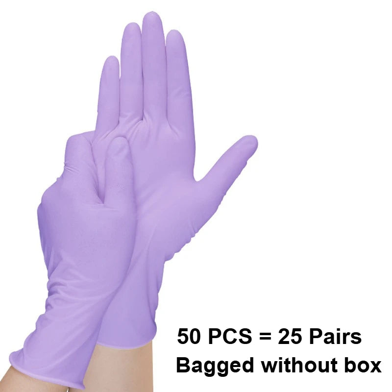 A pair of light purple disposable nitrile gloves shown against a white background.