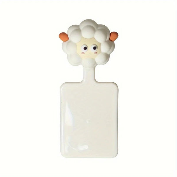A white cartoon toilet seat lifter handle with a fluffy, light-colored head design.