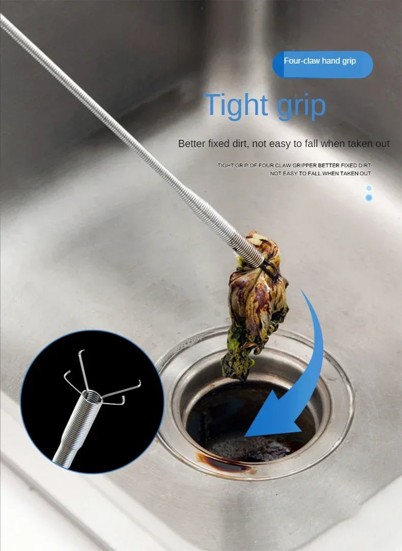 A close-up of a four-claw hand grip tool used to remove stuck food from a sink drain.