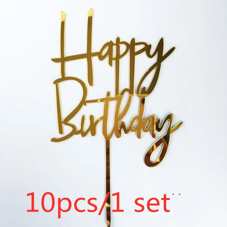 Gold acrylic birthday cake toppers spelling out Happy Birthday