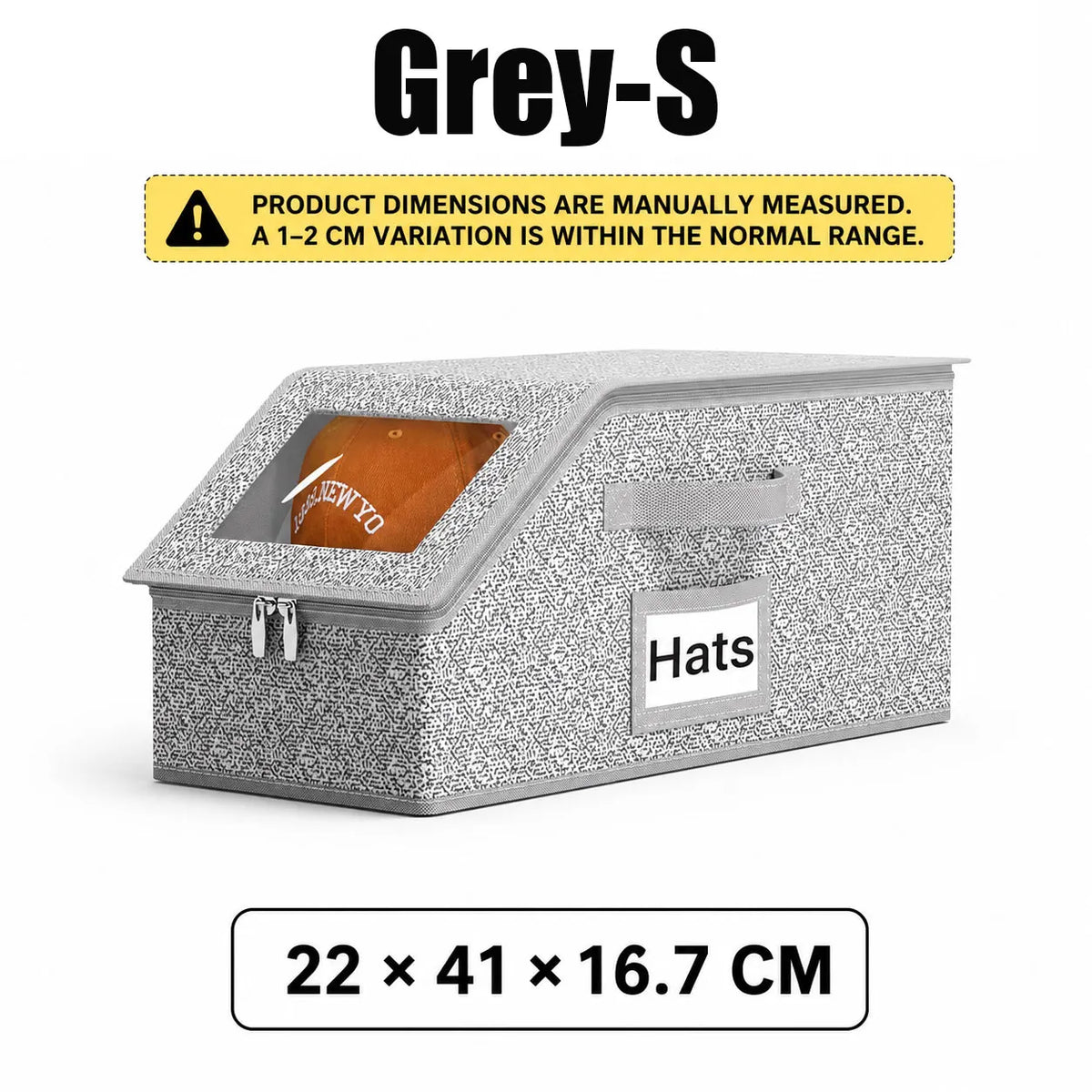 A grey stackable hat storage box with a clear window showing an orange hat and a label for hats.